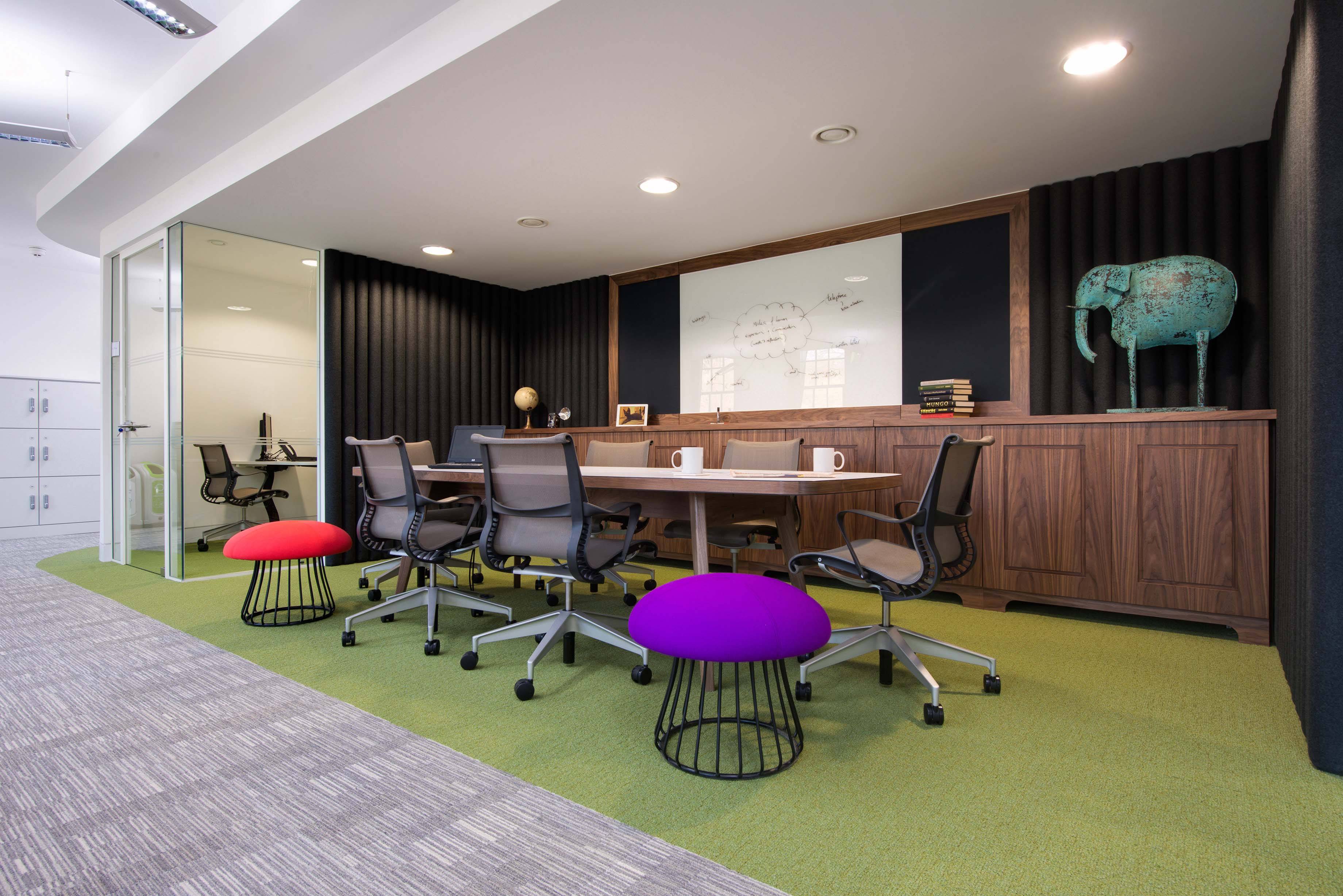 Open plan boardroom with glass whiteboard